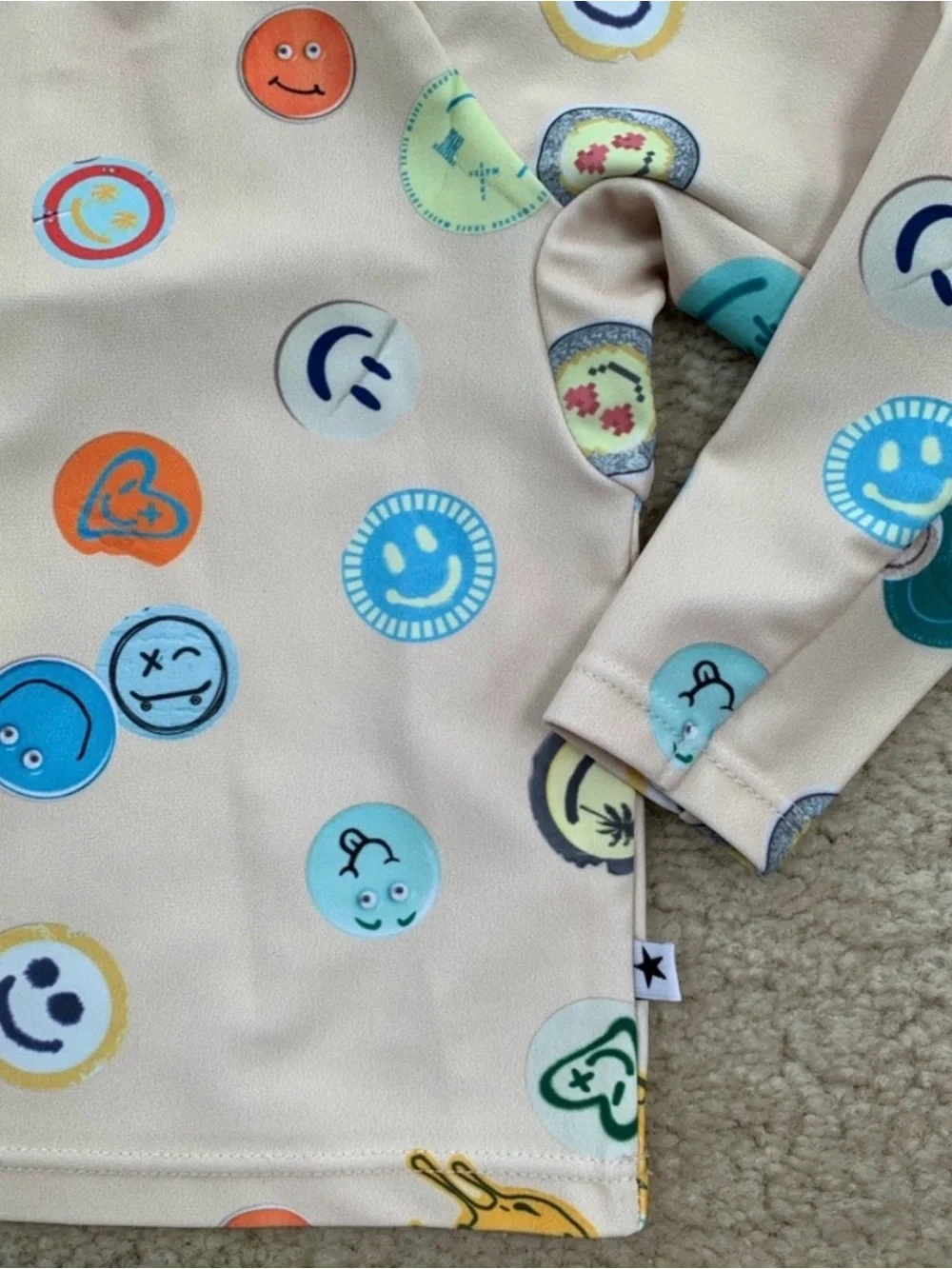 Molo Beige Swimsuit with Orange, Blue and Green Accents